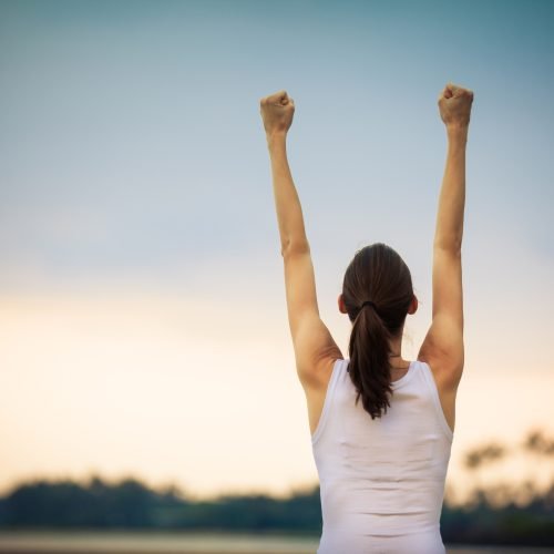 Woman celebrating her goals. Winning concept.
